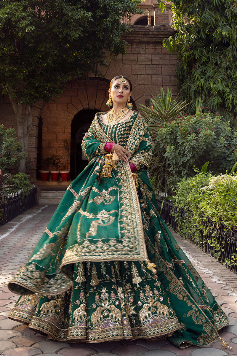 Mohsin Naveed Ranjha Nazneen Unstitched Gold Green Lehenga Choli Formal Collection on Raw Silk